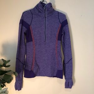 Lululemon Cute 1/2 zip workout shirt.